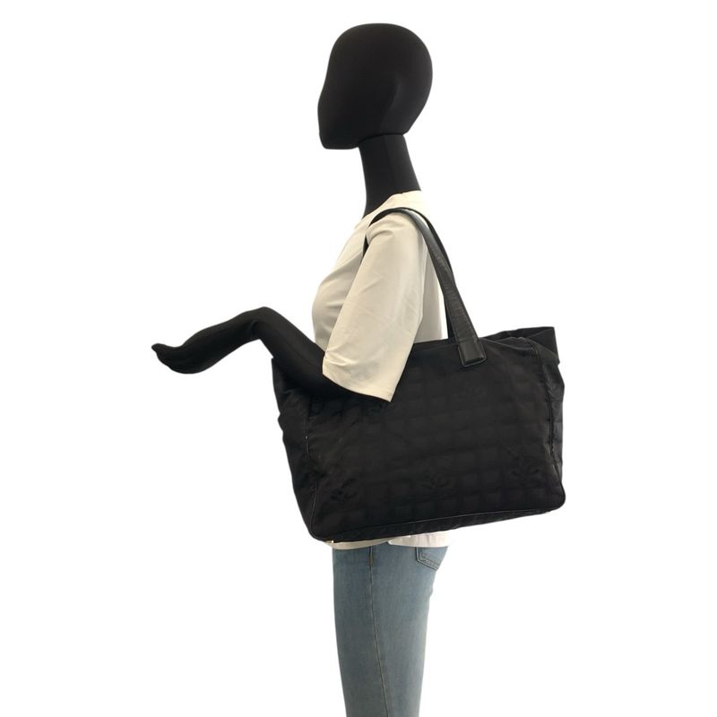 Chanel New Travel Leather
