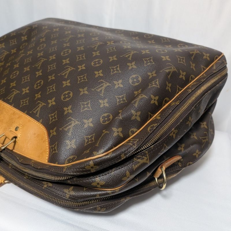 Louis Vuitton Alize de Poche Monogram Boston Bag