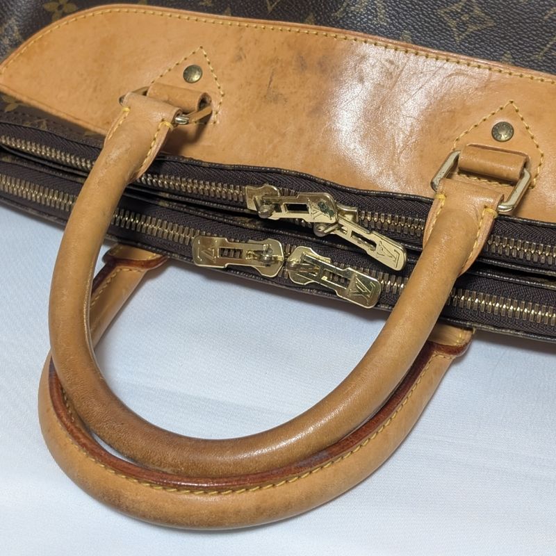 Louis Vuitton Alize de Poche Monogram Boston Bag