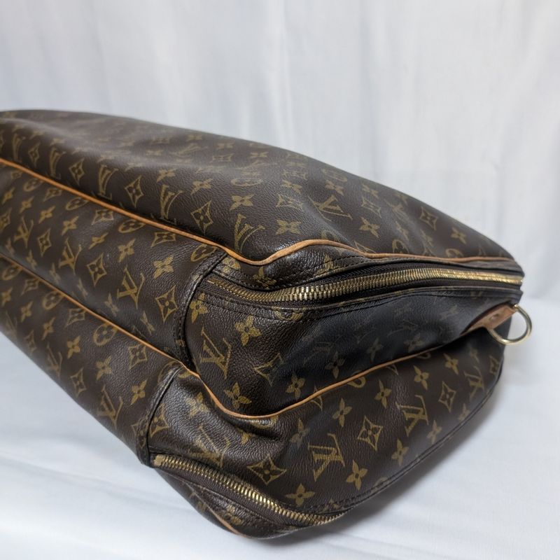 Louis Vuitton Alize de Poche Monogram Boston Bag