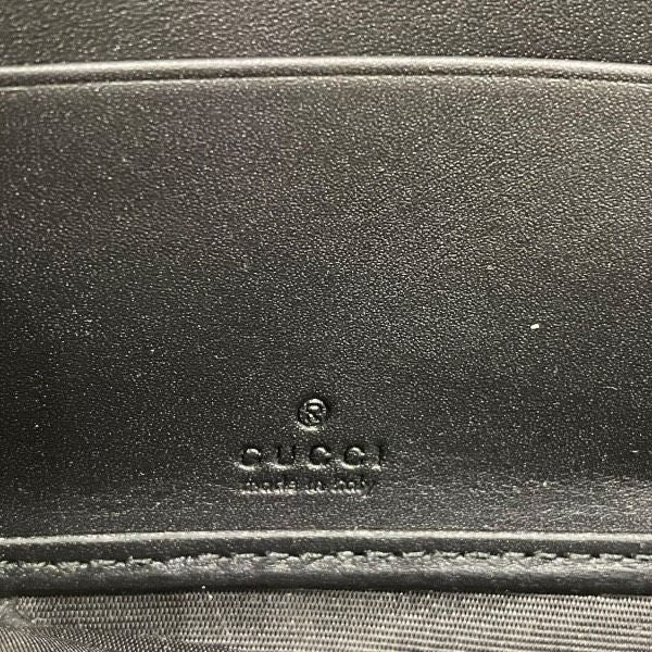 Gucci GG Supreme Bi Zip Around Wallet