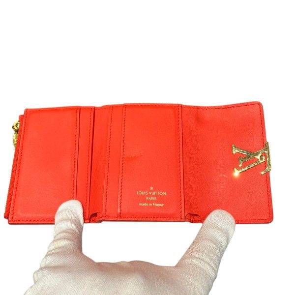 Louis Vuitton Taurillon Portefeuille Capucines XS Trifold Wallet Coral Tahiti