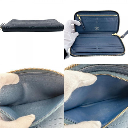 Louis Vuitton Zippy Vertical Monogram Empreinte Leather Wallet Navy