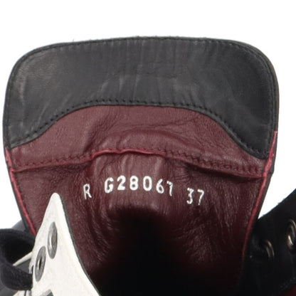 Chanel Quilted CC Logo Bicolor Sneakers Leather Black White