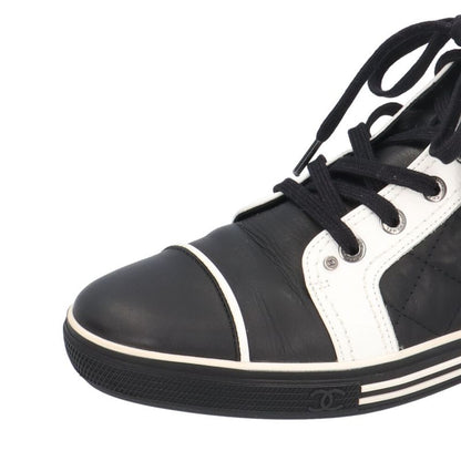 Chanel Quilted CC Logo Bicolor Sneakers Leather Black White