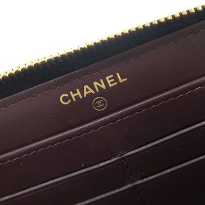 Chanel Caviar Quilted Round Zip Wallet