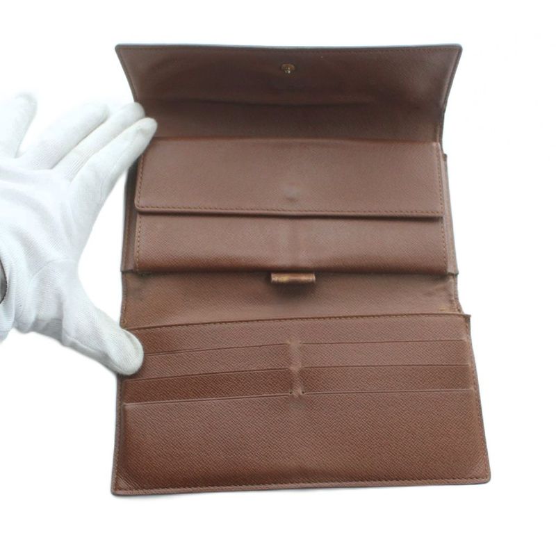 Louis Vuitton Monogram Porte Tresor International Wallet Logo