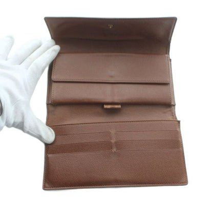 Louis Vuitton Monogram Porte Tresor International Wallet Logo