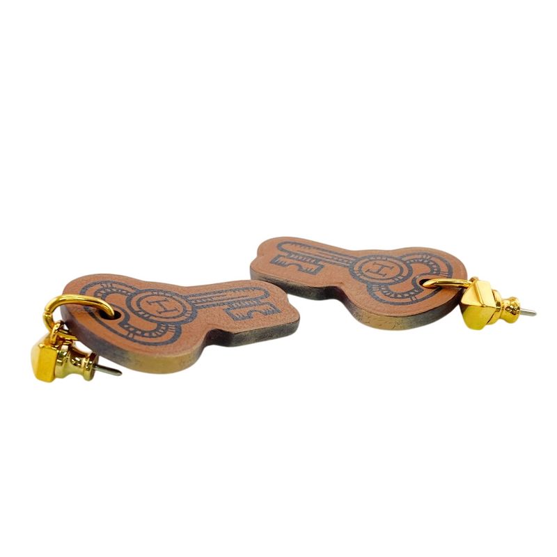 Hermes Curiosity Leather Earrings Brown