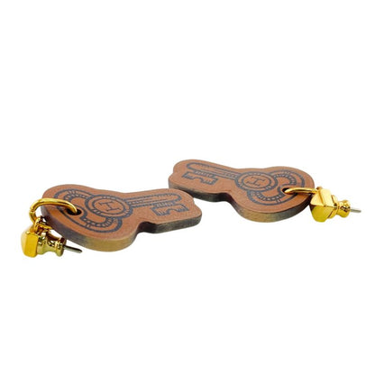 Hermes Curiosity Leather Earrings Brown