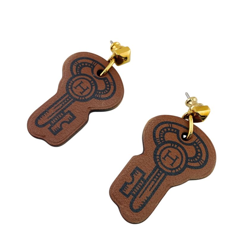 Hermes Curiosity Leather Earrings Brown