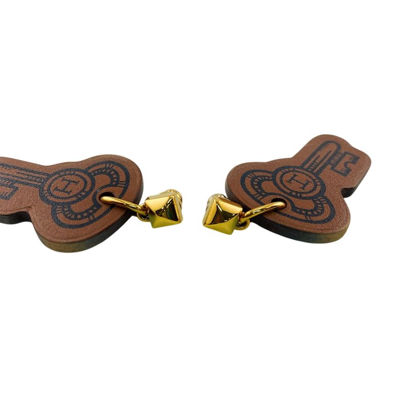 Hermes Curiosity Leather Earrings Brown