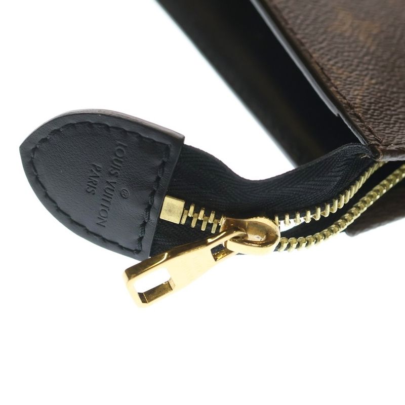 Louis Vuitton Poche Toilette NM Monogram Clutch Brown