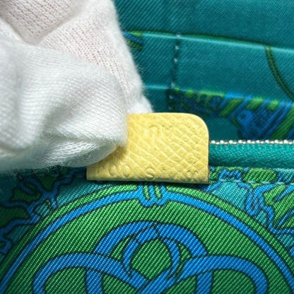 Hermes Zip Around Wallet Azap Silk in Yellow