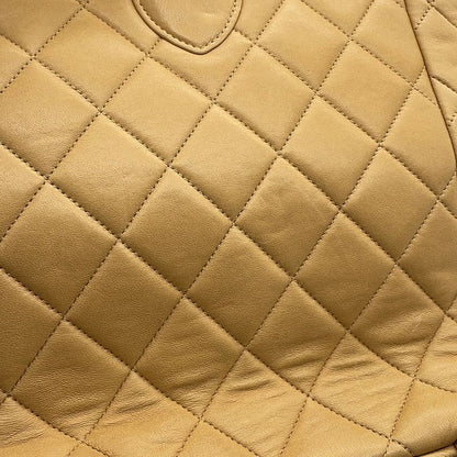 Chanel CC Logo Quilted Chain Lambskin Backpack