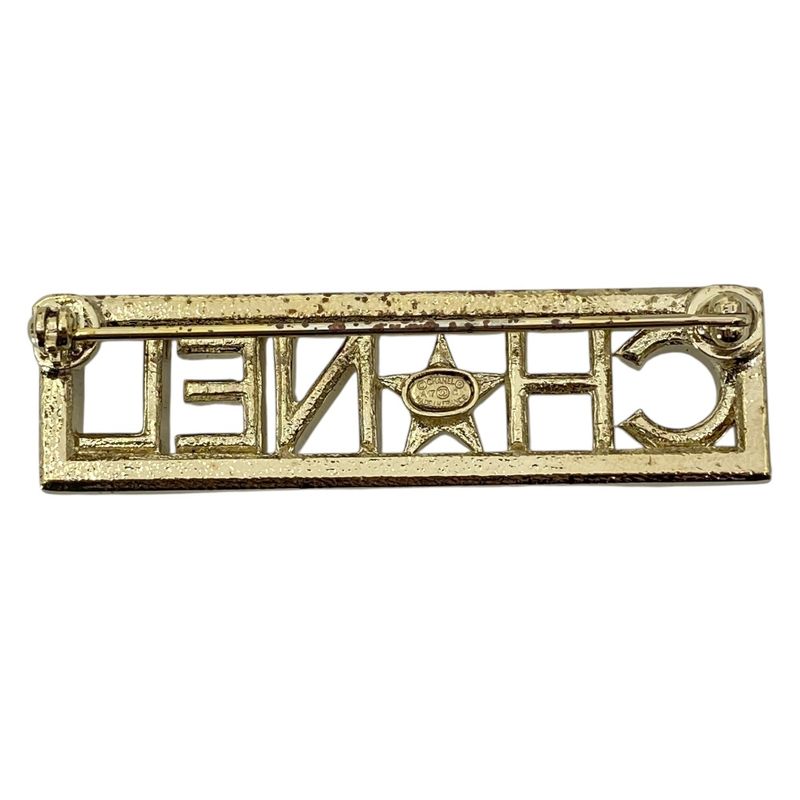 Chanel Logo Brooch Pin Star Gold Sophistication Luxury Gorgeous Presence