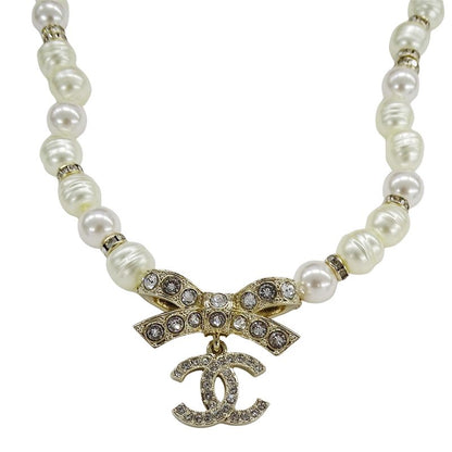 Chanel Choker Necklace Metal Line Stone Faux Pearl Ribbon CC Logo Gold White
