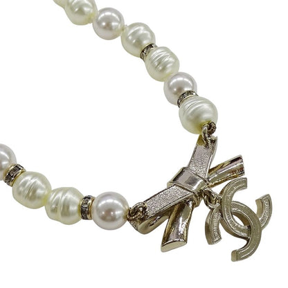 Chanel Choker Necklace Metal Line Stone Faux Pearl Ribbon CC Logo Gold White