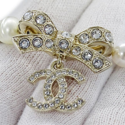 Chanel Choker Necklace Metal Line Stone Faux Pearl Ribbon CC Logo Gold White