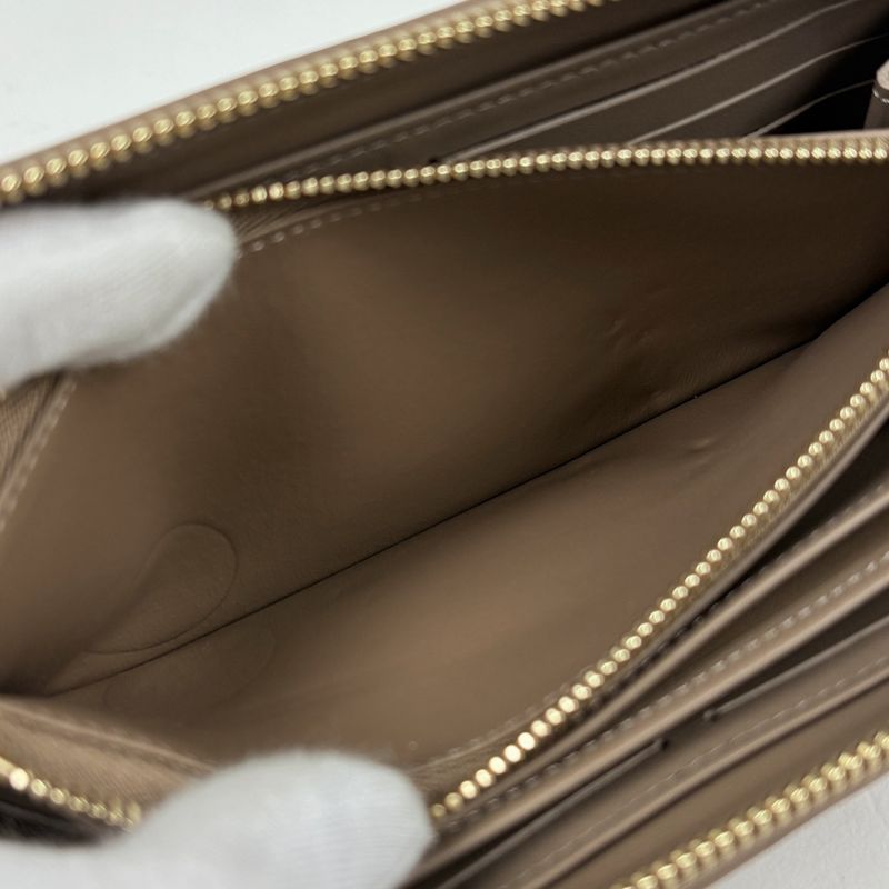 Louis Vuitton Zippy Wallet Coussin Embossed Monogram Leather Taupe