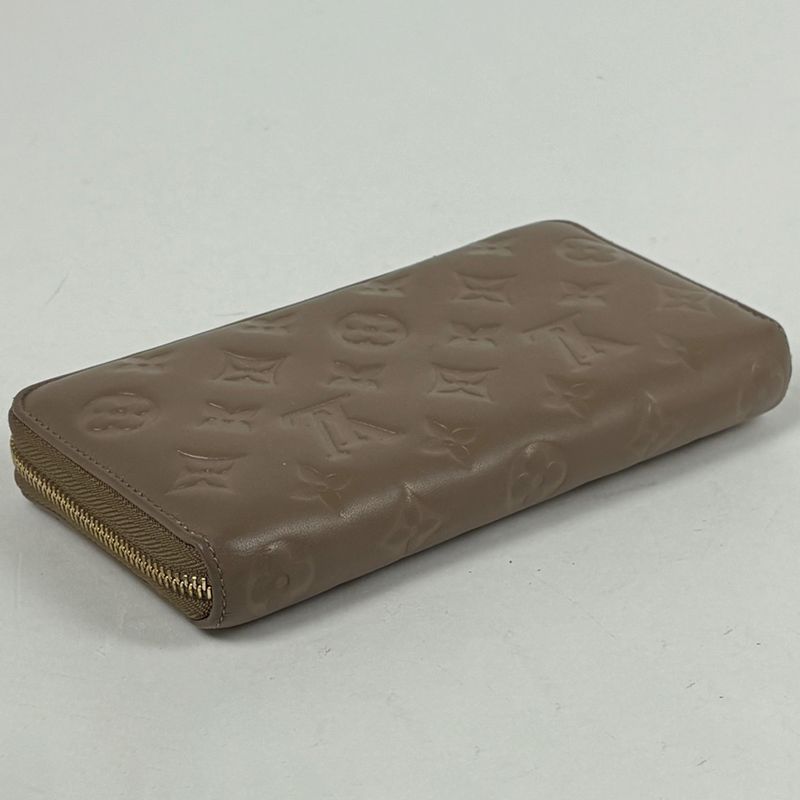 Louis Vuitton Zippy Wallet Coussin Embossed Monogram Leather Taupe
