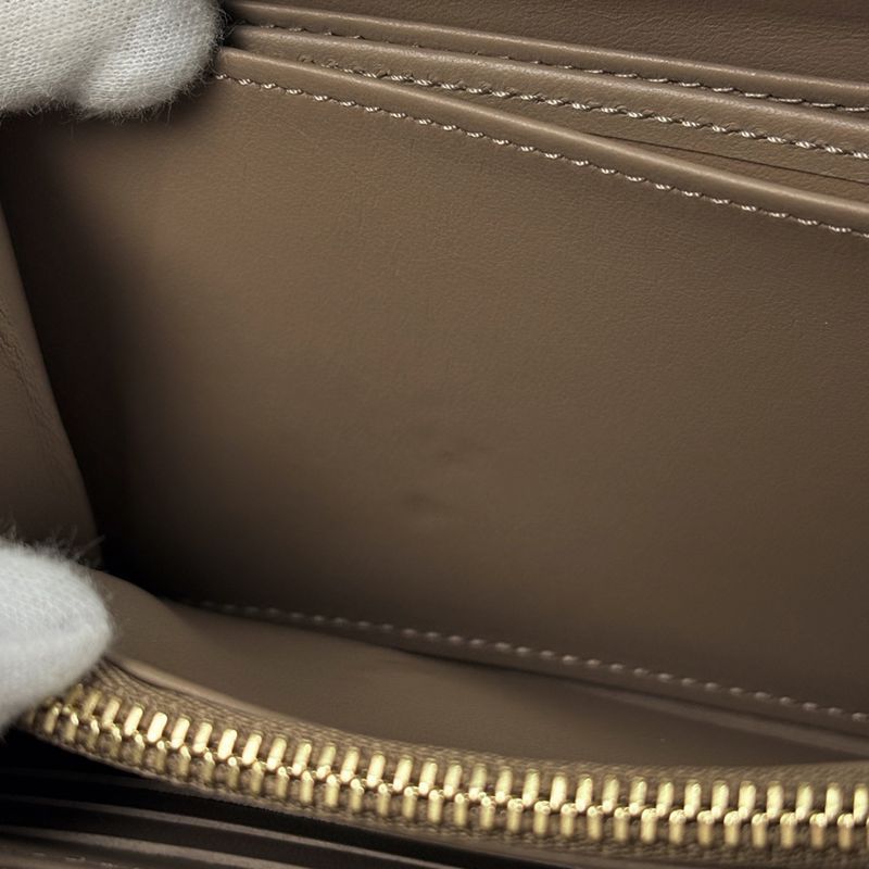 Louis Vuitton Zippy Wallet Coussin Embossed Monogram Leather Taupe