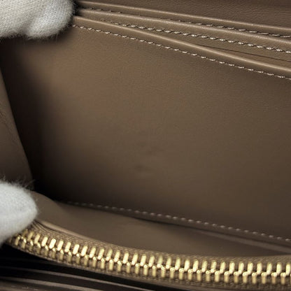 Louis Vuitton Zippy Wallet Coussin Embossed Monogram Leather Taupe