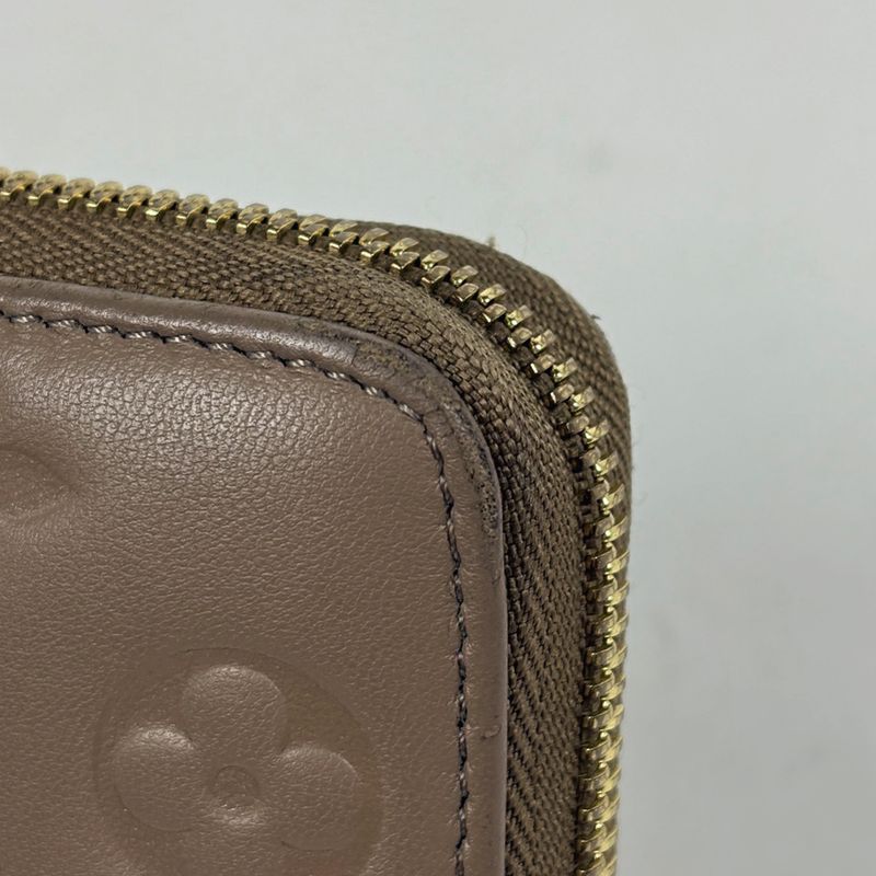Louis Vuitton Zippy Wallet Coussin Embossed Monogram Leather Taupe