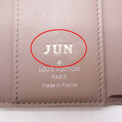 Louis Vuitton Years Portefeuille Capucines Compact XS Wallet Trifold with Coin