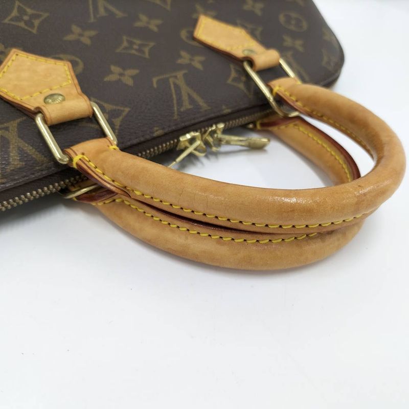 Louis Vuitton Alma Handbag Monogram