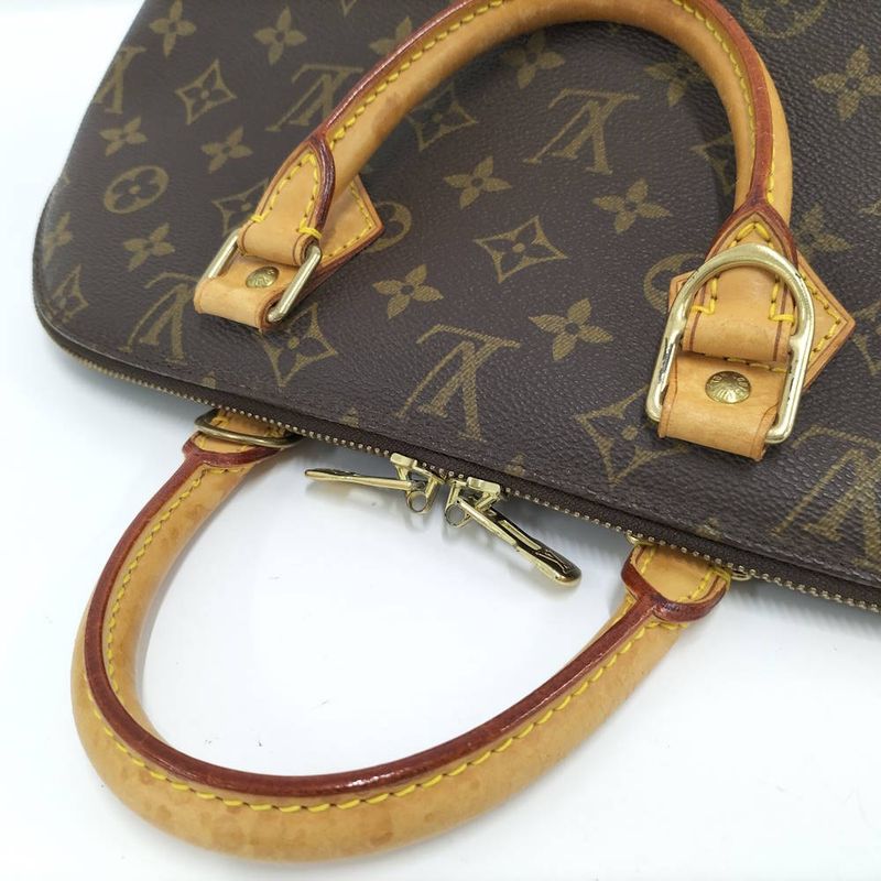 Louis Vuitton Alma Handbag Monogram