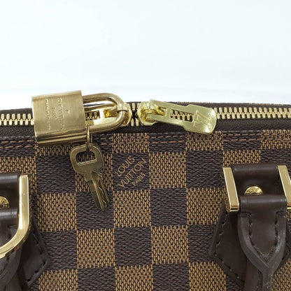Louis Vuitton Alma PM Handbag Damier Ebene