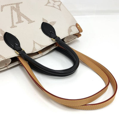 Louis Vuitton on the Go MM 2-Way Bag Monogram Giant Cream Black