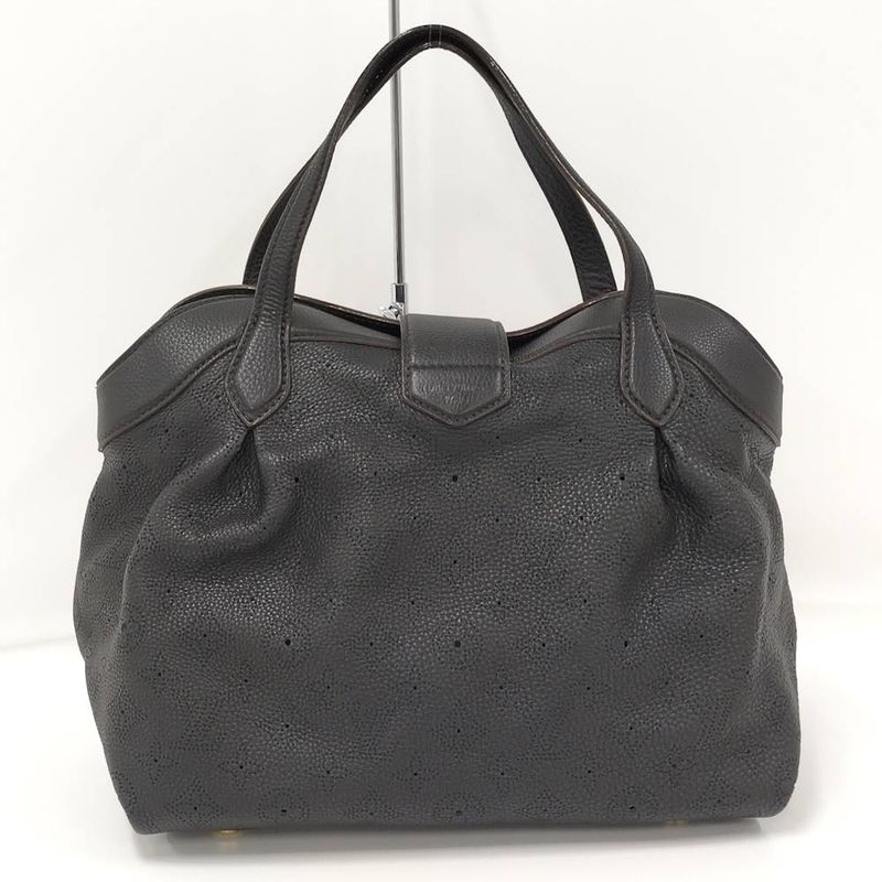 Louis Vuitton Seal PM Handbag Monogram Mahina