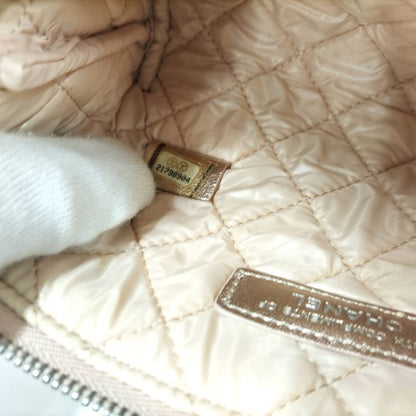 Chanel Quilted Cosmetic Pouch Metallic CC Logo Lambskin Pink