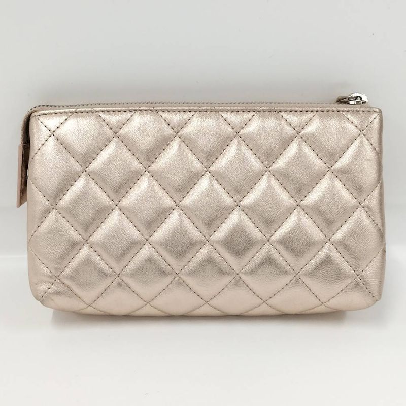 Chanel Quilted Cosmetic Pouch Metallic CC Logo Lambskin Pink