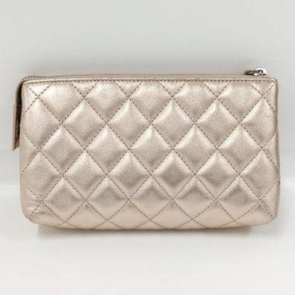Chanel Quilted Cosmetic Pouch Metallic CC Logo Lambskin Pink