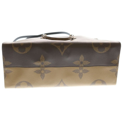 Louis Vuitton Monogram Reverse on the Go GM Handbag Brown Leather