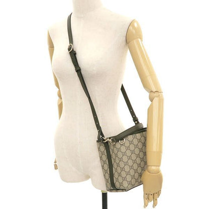 Gucci GG Emblem Small Bucket Messenger Bag