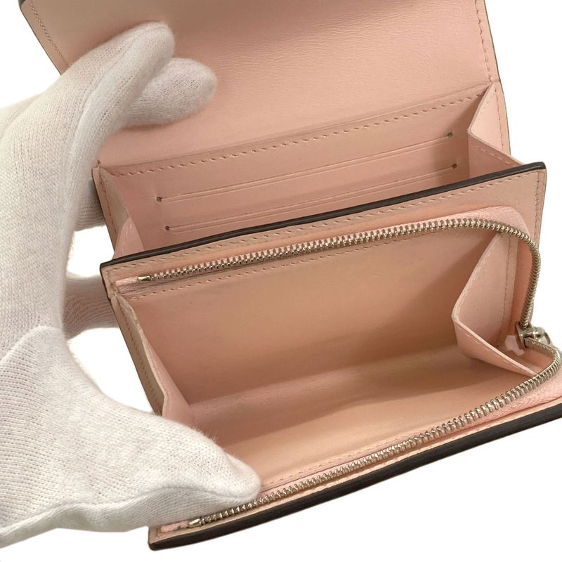 Louis Vuitton Portefeuille Iris Compact Bifold Wallet Mahina Leather