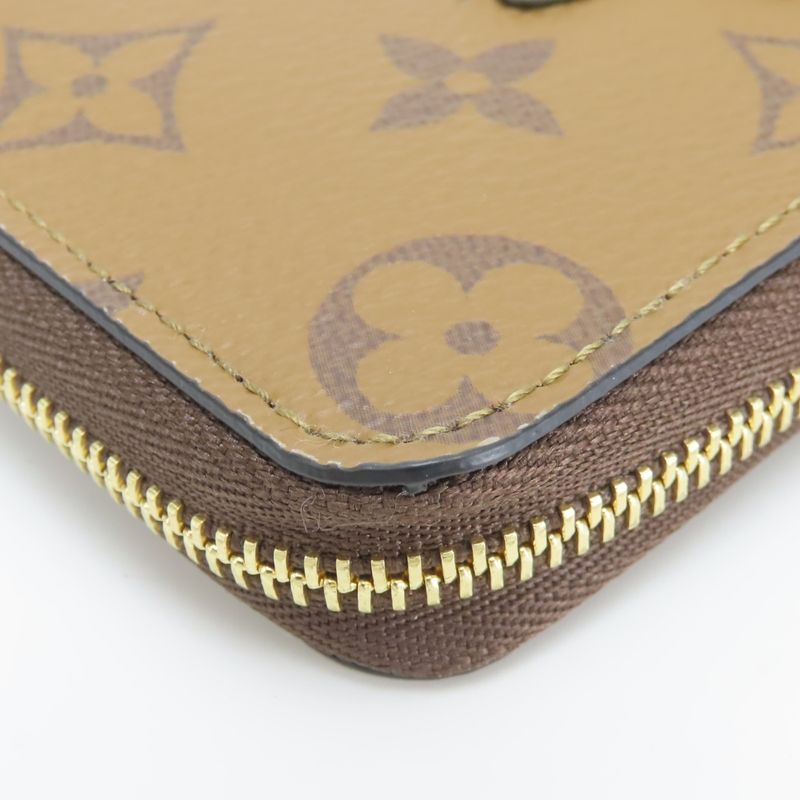 Louis Vuitton Coin Case Zippy Purse Duck Monogram Reverse Brown Sun Yitian