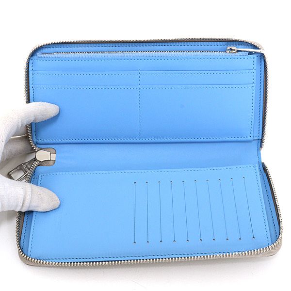 Louis Vuitton Taurillon Climbing Zippy Wallet Vertical Chalk White