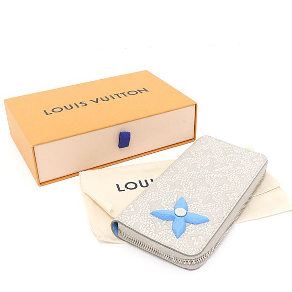 Louis Vuitton Taurillon Climbing Zippy Wallet Vertical Chalk White