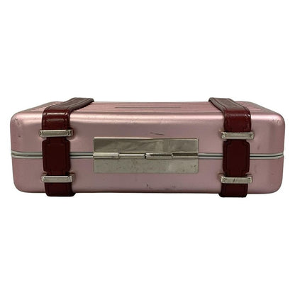 Dior Clutch and Rimowa Personal Pink Gold Collaboration