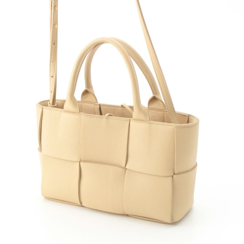Bottega Veneta Leather Maxi Intrecciato Mini Arco 2-Way Handbag Beige
