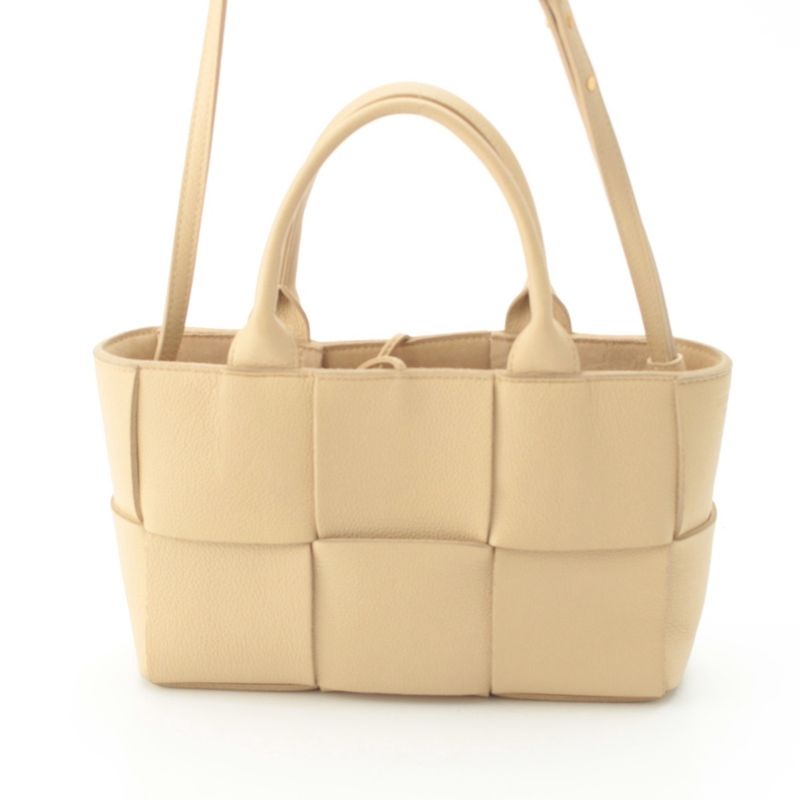 Bottega Veneta Leather Maxi Intrecciato Mini Arco 2-Way Handbag Beige
