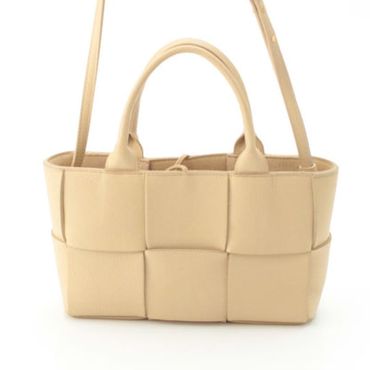 Bottega Veneta Leather Maxi Intrecciato Mini Arco 2-Way Handbag Beige