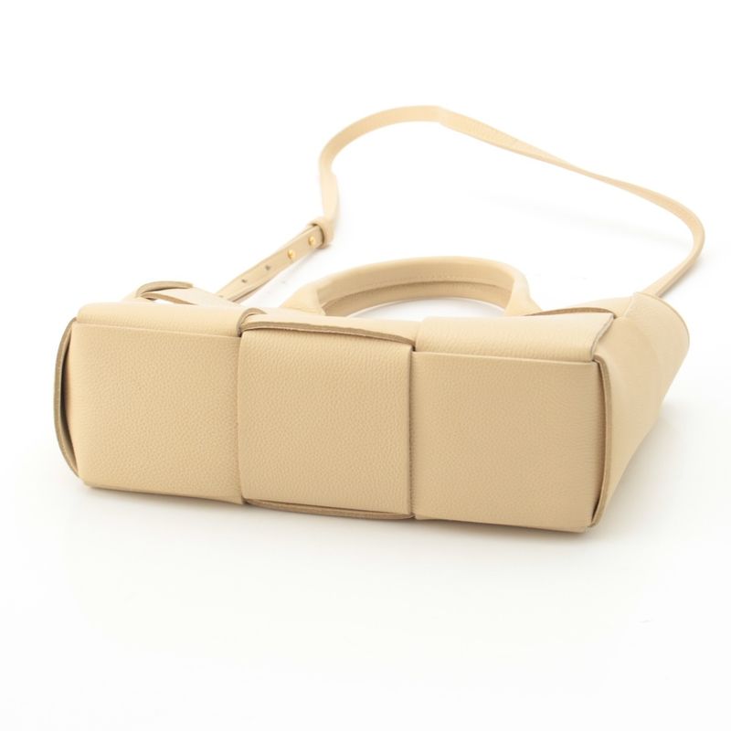 Bottega Veneta Leather Maxi Intrecciato Mini Arco 2-Way Handbag Beige