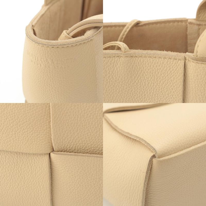 Bottega Veneta Leather Maxi Intrecciato Mini Arco 2-Way Handbag Beige