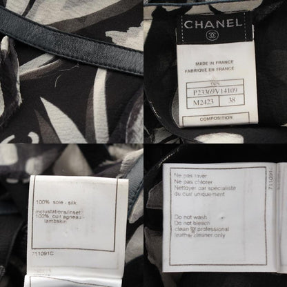 Chanel Silk Sheer Sleeveless CC Logo All Over Pattern Back Open Blouse Monotone